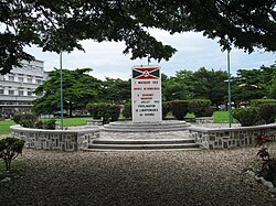 flag sign at flagpole and raised plaza