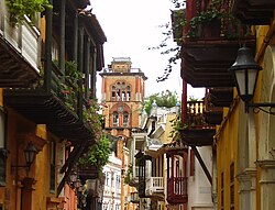 The Convent of San Agustín at background, convent built in 16th-century, and since 1828 is occupied by the University of Cartagena. Currently, of the original structure of this convent remains only the cloister, the arches and the supporting walls. The tower is of Italian Revival style and as the large interior garden and courtyard.[citation needed]