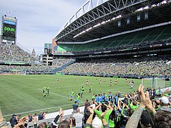 Sounders players celebrating a goal against the Colorado Rapids, 2014
