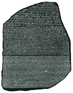 The Rosetta Stone (c. 196 BC) enabled linguists to begin deciphering ancient Egyptian scripts.[128]