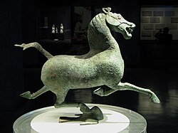 The Flying Horse of Gansu, depicted in full gallop, bronze sculpture 34.5 cm in height. Wuwei, Gansu (25–220 AD)