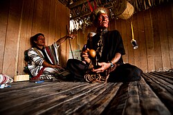 Asháninka men in house, Acre, 2010