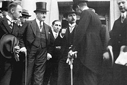 Turkish delegation after having signed the Treaty of Lausanne. The delegation was led by İsmet İnönü (in the middle) and Rıza Nur (on the left wearing the top hat).