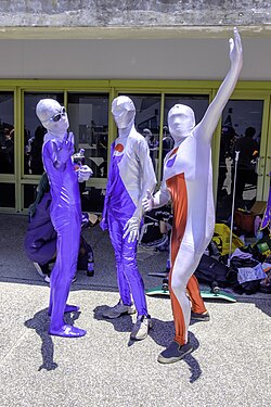 Cosplayers dressed as Pepsiman