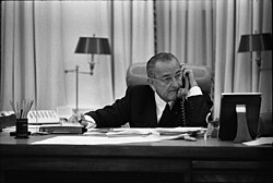 Johnson on a telephone call in the Oval Office.