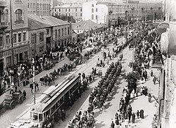 Polish troops enter Kyiv in May 1920 during the Polish–Soviet War. Following the Peace of Riga signed on 18 March 1921, Poland took control of modern-day western Ukraine while Soviets took control of eastern and central Ukraine