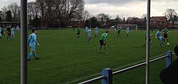 A non-league match between Maine Road F.C. and 1874 Northwich of the North West Counties Football League, part of the ninth level of English football.