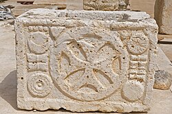 Ash chest with a Christian symbol, located in the national museum