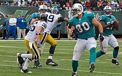 Halfback Ronnie Brown throwing out of the Wildcat formation