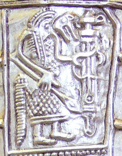 The seventh-century Gutenstein scabbard, found near Sigmaringen, Baden-Württemberg, is a late testimony of pagan ritual in Alemannia, showing a warrior in ritual wolf costume, holding a ring-spatha.