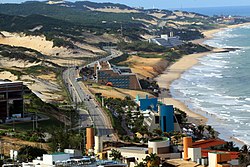 The Coastal Highway (RN-301), an expressway between the Atlantic Ocean and the Natal Dunes State Park, significantly boosted local tourism starting in the 1980s.[72] Along its length are the city's four-star and five-star hotels.[73]