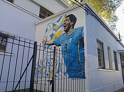 Mural of Suárez on his former school in Montevideo, Uruguay