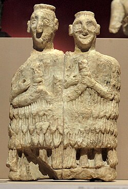 Ancient Sumerian statuette of two gala priests, dating to c. 2450 BCE, found in the temple of Inanna at Mari