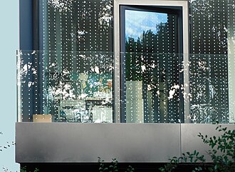 Windows fitted with a dotted grid pattern to prevent bird collisions