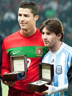 Messi has been compared with Cristiano Ronaldo (left) throughout much of their careers.