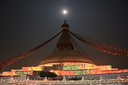 Colorful celebrations in Boudhanath Stupa, Nepal during the night of full moon in Buddha Purnima