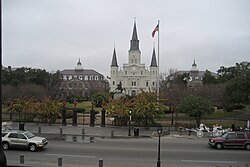 View of Jackson Square. The Cathedral is the central building, with the Cabildo to the left and the Presbytere to the right.
