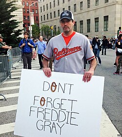 A demonstrator raising awareness of the death of Freddie Gray in Baltimore, April 2015