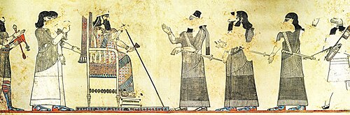 A wall painting from Til Barsip depicting Tiglath-Pileser (sitting) holding court. The official closest to him to the right is his son Shalmaneser V.[2]