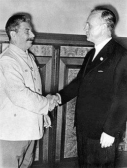German Foreign Minister Joachim von Ribbentrop (right) and the Soviet leader Joseph Stalin after signing the Molotov–Ribbentrop Pact, 23 August 1939
