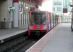 A Docklands Light Railway train leaving Canary Wharf DLR station