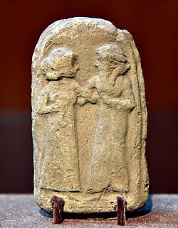 Man and woman, Old-Babylonian fired clay plaque from Southern Mesopotamia. Sulaymaniyah museum, Sulaymaniyah. Iraq