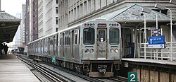 A 2600 series car brings up the rear of a Red Line train (temporarily rerouted through the elevated tracks of the Chicago Loop) at Randolph/Wabash.