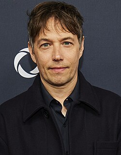 Sean Baker won for Anora (2024).