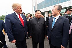 Trump with the North and South Korean leaders. This is the first time an American president entered the zone.