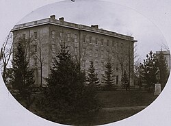 Mason Hall, with a statue of Benjamin Franklin in front. Photograph taken prior to 1870.