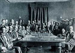 Signing of the Boxer Protocol. Left, from left to right: F.M Knobel from Netherlands (only see his hands); K. Jutaro from Japan; G. S. Raggi from Italy; Joostens from Belgium; C. von Walhborn from Austria-Hungary; B. J. Cologán from Spain; M. von Giers from Russia; A. Mumm for German Empire; E. M. Satow from Britain; W. W. Rockhill from US; P. Beau from France; Lian Fang; Li Hongzhang; Prince Qing