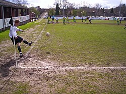 Player takes a corner kick
