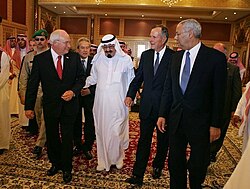 Powell walks with newly crowned King Abdullah of Saudi Arabia, Vice President Dick Cheney, and former President George H. W. Bush, Saudi Arabia, August 2005