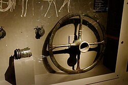 Bronze chariot wheel, Urnfield culture, c. 13th–12th century BC[86]