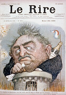 French caricature of Rhodes, showing him trapped in Kimberley during the Second Boer War, here peering from a tower clutching papers, with a champagne bottle behind his collar