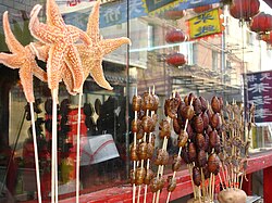 Fried starfish skewers in China