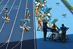 Volunteers working at the Olympic Stadium during the Games