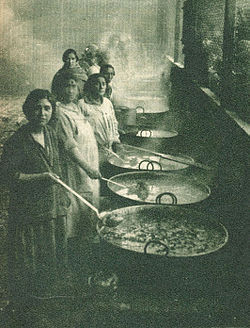 Women prepare community soup kitchens in 1932 to feed the unemployed.