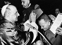 Pope Paul VI imposing the cardinal biretta on Wojtyła in 1967