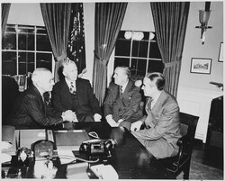 Secretary of Defense George C. Marshall discussing the Korean War with President Truman and Special Assistant to the President Averell Harriman in the Oval Office