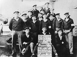 The soldiers' council of the battleship Prinzregent Luitpold in November 1918. The sign reads, "Soldiers' council Prinzregent Luitpold. Long live the socialist republic."