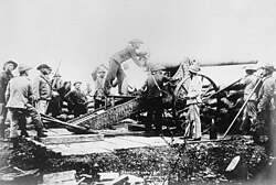 The Boer "Long Tom" in action during the siege