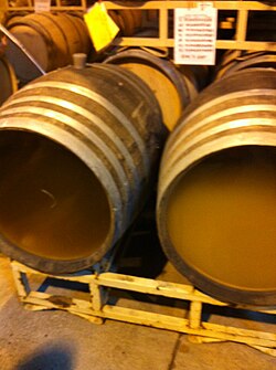 Chardonnay is often aged on its lees in barrels with the lees periodically stirred to give it a softer, creamy mouthfeel. The example on the right is a barrel of Chardonnay that has had its lees recently stirred.