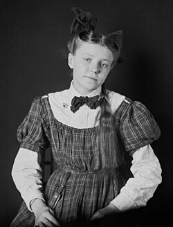 Lillian Gross, described as a "Mixed Blood" by the Smithsonian source,[full citation needed] was of Cherokee and European American heritage. She identified with the Cherokee culture in which she was raised.