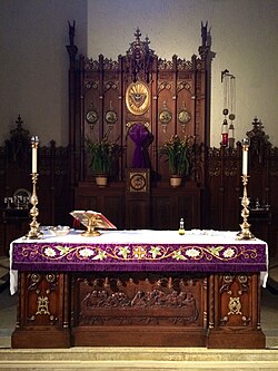 The chancel of a church on Ash Wednesday 2015 (the veiled altar cross and purple paraments are customary during Lent)