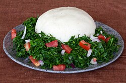 Ugali and sukuma wiki, staples of Kenyan cuisine