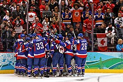 The Slovak national ice hockey team celebrating a victory against Sweden at the 2010 Winter Olympics