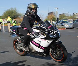 Wearing a helmet while riding a motorcycle