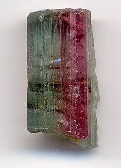 Bi-chromatic tourmaline crystal, 0.8 inches (2 cm) long