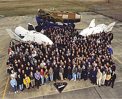 The X-38 Development Team with V131R, V132, and V201 on the east side of B220 at the Johnson Space Center at the close of the project (2002)